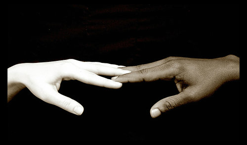 black-and-white-hands-joining-fingers-together